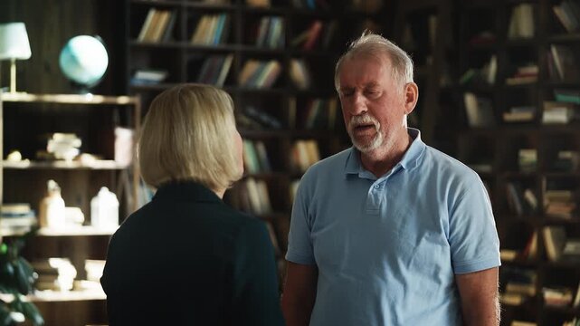 Sad senior man telling bad news about disease to adult daughter, family support