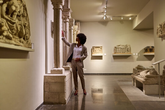 Confident African American businesswoman Visiting Art Gallery Lifestyle Concept