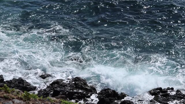Large waves from Storm Therese impacting coastal area and shoreline infrastructure.