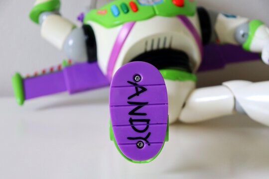 Salvador, Brazil - March 20, 2026: Close-up of the name 'Andy' written in black marker on the bottom of Buzz Lightyear's space ranger boot. Toy Story movie concept.