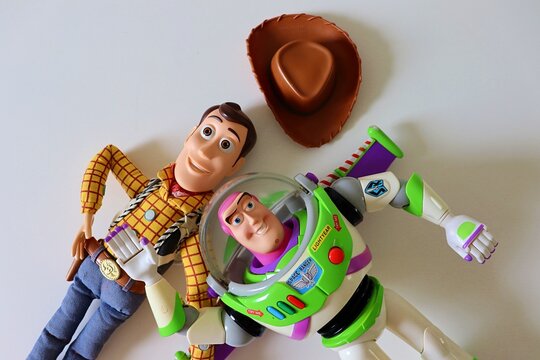 Salvador, Brazil - March 20, 2026: Woody and Buzz Lightyear toys from Toy Story movie franchise on a white background. Toy Story concept.