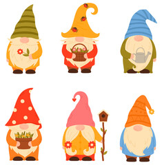 Fototapeta premium A set of garden gnomes in pointy hats. Little fairytale characters with beards.