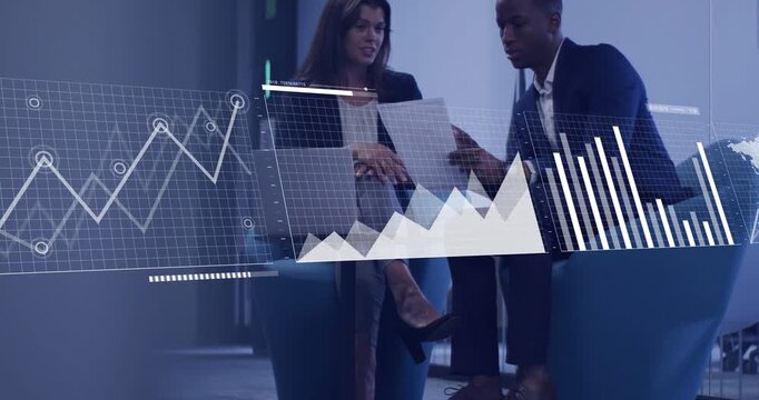 Vertical video: Holding paper, two pros in suits using charts on laptop at office lounge for review