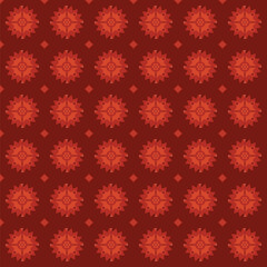 Fototapeta premium Seamless vector pattern with repeating orange floral motifs and small diamond shapes on a rich dark red background, ideal for textile, wallpaper, digital paper, and branding projects.
