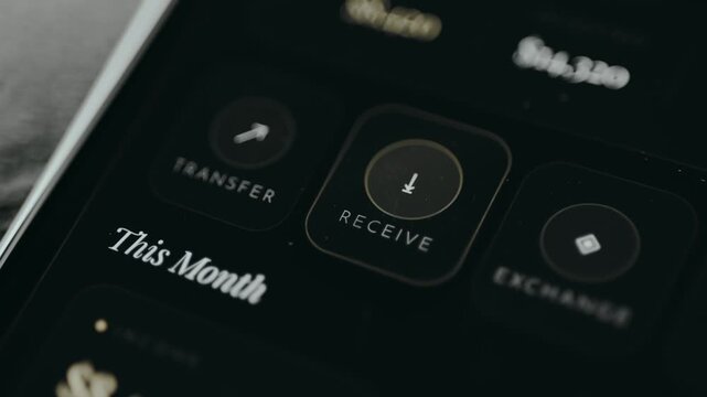 User taps the RECEIVE button for a financial transaction