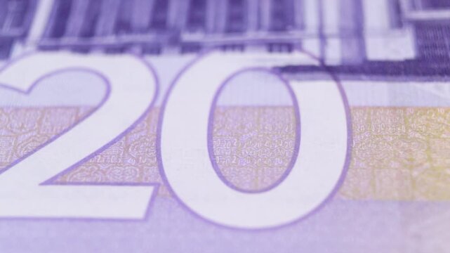 The reverse side of a 20 Ghana Cedi note is showcased in a detailed macro pan, focusing on the Supreme Court building, the mauve color palette, and the fine intaglio printing of the national monument.