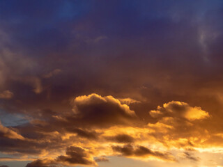 Obraz premium Dark dramatic sunset sky. Nature background for design. Strong colors.