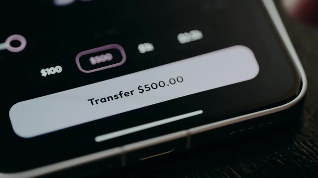 Person transferring 500 USD by a banking application