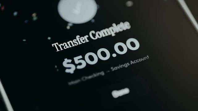 Message about a completed transfer of 500 USD from main checking account to savings account