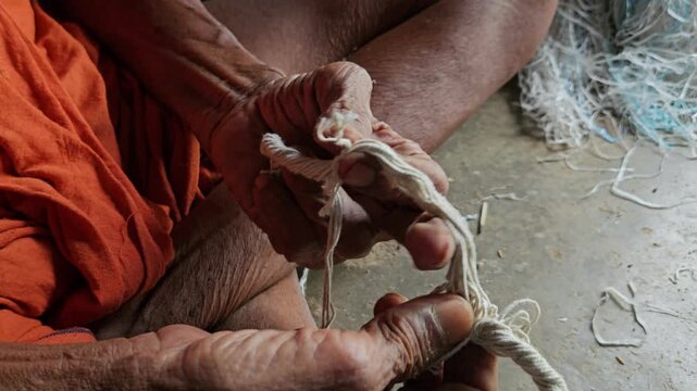 Elder Indian Brahmin Man Making Sacred Thread Janeyu, Traditional Yajnopavita Craft, Hindu Ritual Object Preparation, Cultural Heritage and Religious Practice Documentary 4K