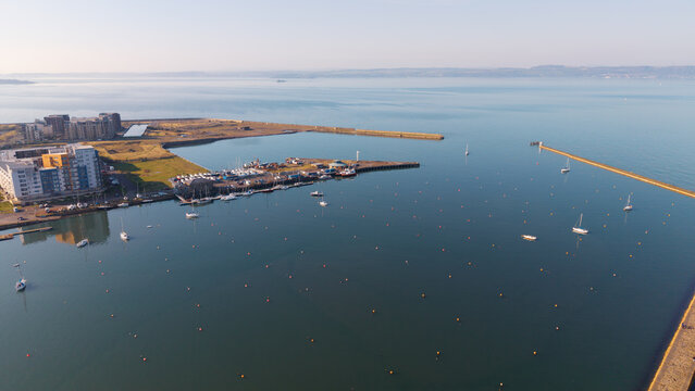 Aerial view of Granton Harbour entrance with moored yachts, Edinburgh, Scotland