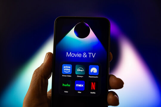 Smartphone Screen Displaying Movie And TV Streaming Apps Including Netflix Disney Plus Prime Video Hulu Max And Paramount Plus. Mobile Device Interface Featuring Popular Video Streaming Platforms