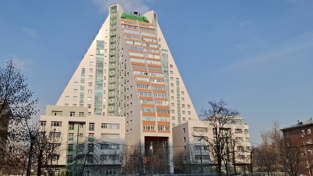 Unique Piramida residential complex in Akademicheskiy district under clear blue sky. Modern 22-story pyramid-shaped building, innovative urban architecture and design. Russia, Moscow, March 20, 2026