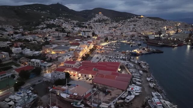 Breathtaking High-Angle Aerial Panorama of Ermoupoli Harbor and Cityscape at Dusk