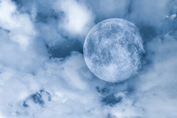 Fototapeta premium Big full moon among clouds in night sky