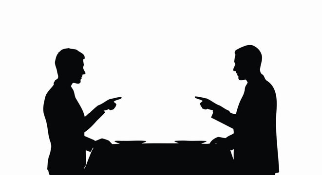 Two business people silhouettes pointing fingers at each other across a table, symbolizing conflict or blame