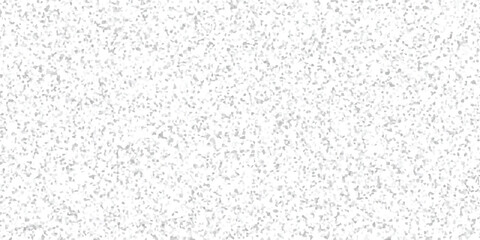 Obraz premium Textured abstract background with a dense pattern of small grey and white irregular shapes creating a granular speckled effect for graphic design