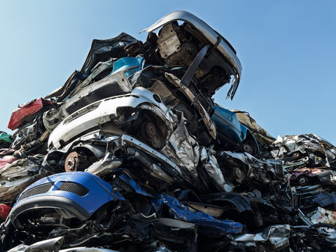 Junked Cars Stacked at Auto Salvage Yard