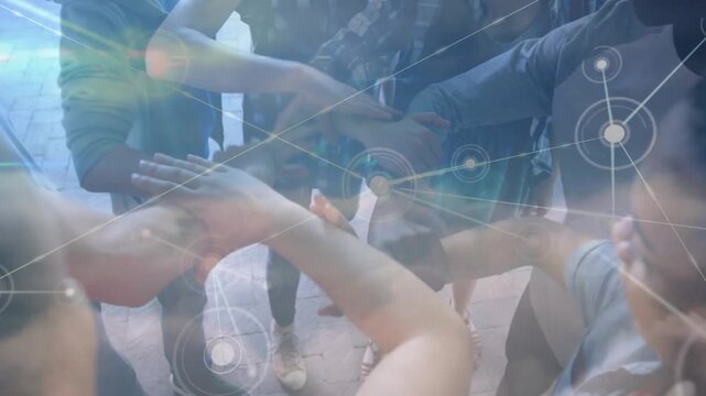 Six peers stepping forward, stacking hands on bricks, building teamwork as nodes linking over hands