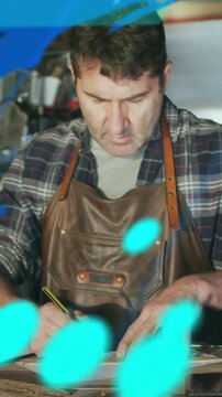 Vertical video: Man drawing lines with pencil or ruler for pattern blue HUD sweeping hiding hands-fa