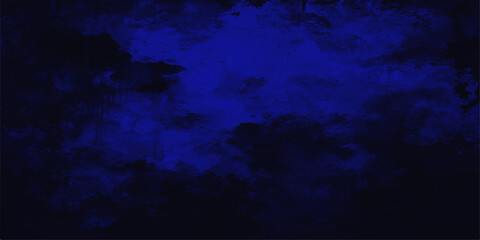 An abstract grunge world map merges with a deep blue ocean texture and dark stormy clouds to create a moody underwater space © MDMURAD