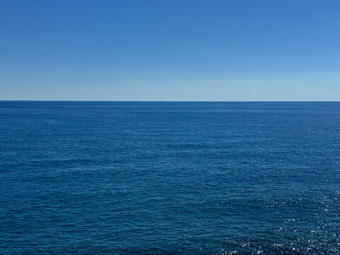 Blue sea and clear sunny sky in summer.