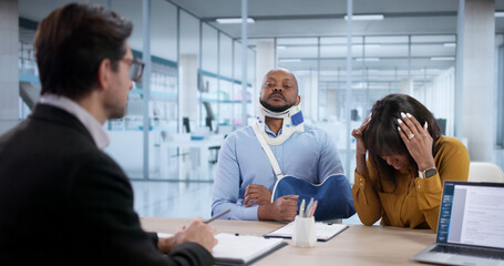 Dedicated Attorney Reviews Injury Claim While Client Feels Frustrated