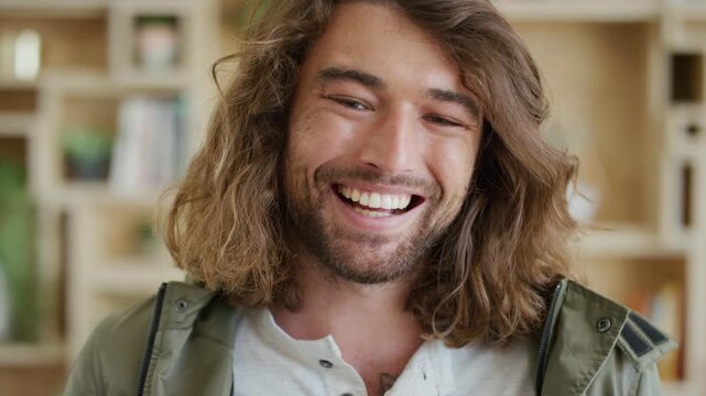 Face, laugh and business man in workplace as screenwriter with humor, about us or pride for career. Portrait, funny worker and professional employee, script writer and happy person in creative office