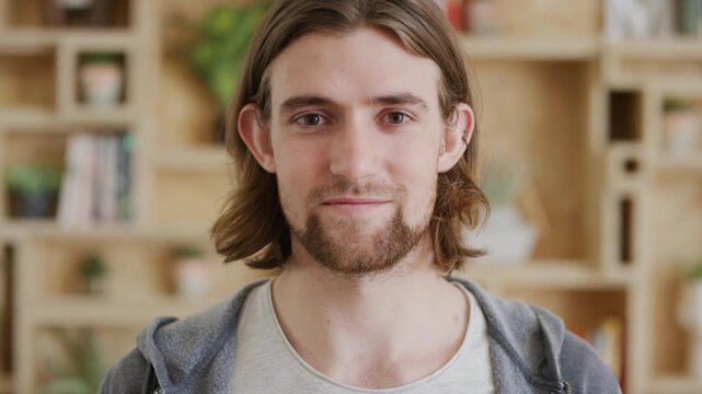 Employee, face and man with pride in office, ambitious or reporter with smile for career development. Newsroom, media and person with job opportunity, creative and happy with employment in Canada