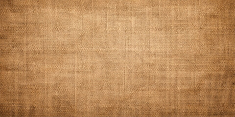 Fototapeta premium Old paper and vintage wood textures blend with rough burlap and natural linen textiles to create a grungy brown canvas backdrop featuring a blank aged pattern on a weathered organic surface
