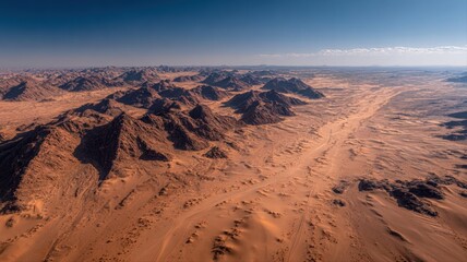 Fototapeta premium Dramatic Desert Landscape with Mountainous Terrain and Arid Climate under a Clear Blue Sky