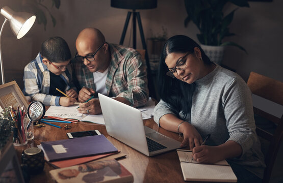 Education, night and remote work with family in home together for homework or small business. Dark, distance learning and startup career with parents helping son for child development or growth