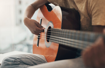 Fototapeta premium Practice, hands and woman with guitar in home with music, song and track for acoustic sound. House, musician and person with musical instrument for playing, performance and creativity for talent
