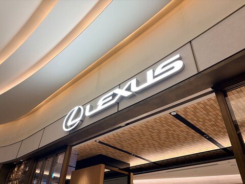 Lexus illuminated brand logo signage at the Buvette cafe and brand experience space with modern architectural details - Tokyo, Japan, March 21, 2026