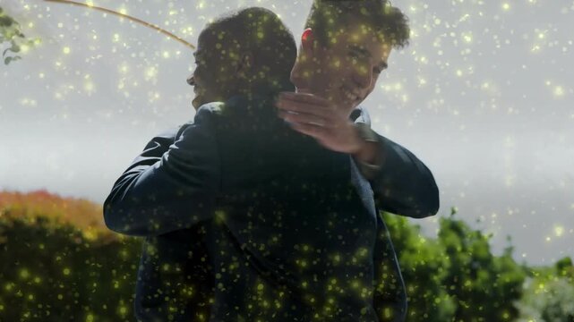 Officiant pronouncing vows couple raising hands shaking and hugging guest, wedding confetti overlay