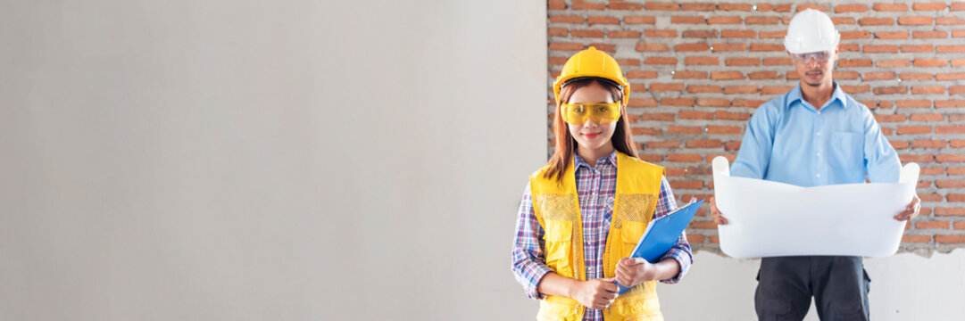 Banner Contractor construction engineer meeting on architect table at construction site. Businessman engineer manager discuss talk together foreman team builder using measure tape with copy space