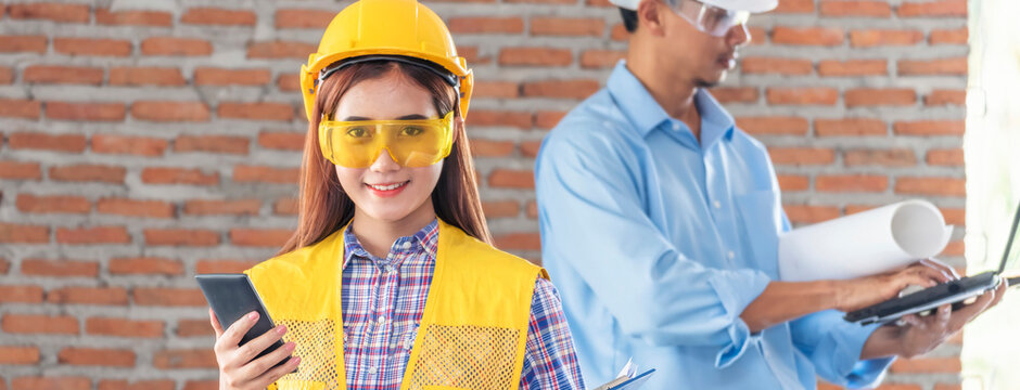 Banner Contractor construction engineer meeting on architect table at construction site. Businessman engineer manager discuss talk together foreman team builder using measure tape with copy space