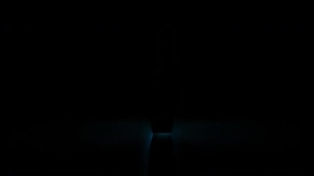 A bright blue neon outline of a cloud with a padlock inside glows against a dark, reflective surface, symbolizing digital security and data protection.