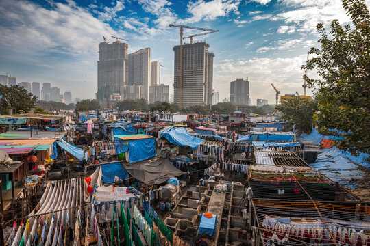 Contrast of Mumbai skyscrapers and Dhobi Ghat laundry.