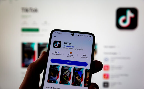 Smartphone Screen Showing TikTok App Page With Install Option In Mobile Application Store. Mobile Interface Displaying Social Media Video Platform And App Download Features In Digital Ecosystem Editor