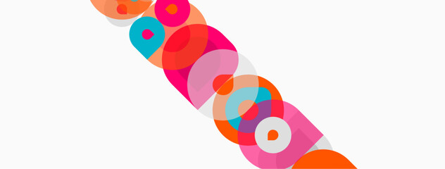Fototapeta premium Abstract colorful circles overlap diagonally across white space. Bright hues create dynamic visual pattern. Simple geometric shapes dominate composition.