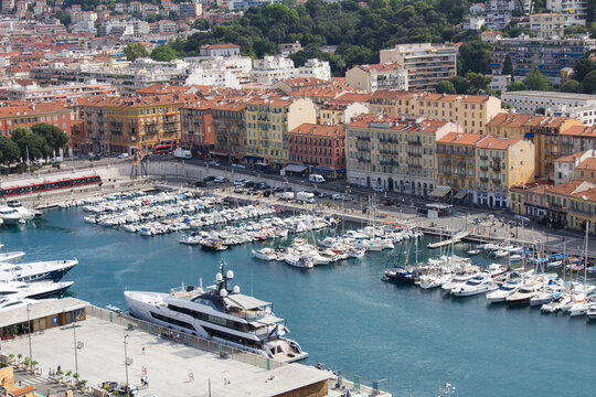 Top view of the white yachts in the seaport and city on a summer day. Nice. France.