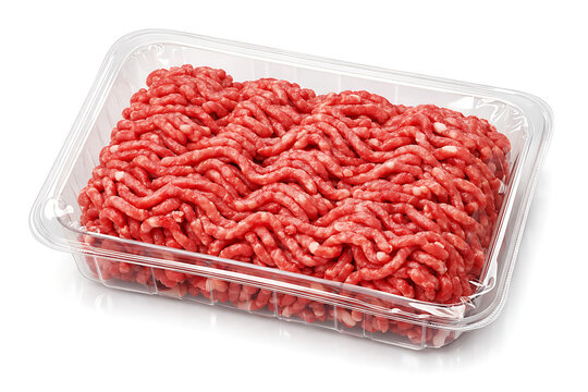 Raw fresh ground beef minced meat in a clear plastic packaging tray isolated on a white background