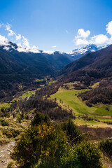 Obraz premium Spring panorama over the Ariège mountains with snow-capped peaks from Montségur Castle, France