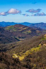Fototapeta premium Spring panorama over the Ariège mountains with snow-capped peaks from Montségur Castle, France