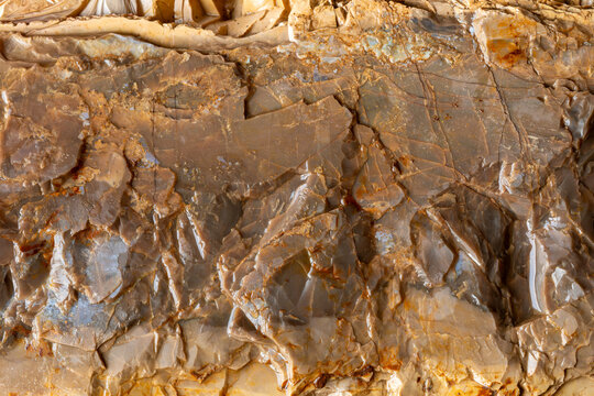 Broken flintstone concretion background texture.