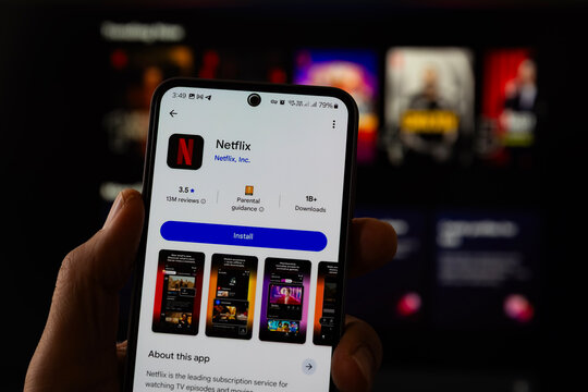 Smartphone Displaying Netflix App Page With Install Option In Mobile Store. Video Streaming Platform Interface Showing Ratings Downloads And Entertainment Content On Android Device Editorial Use Only