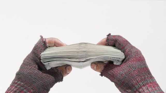 Homeless hands holding US dollar banknotes on white background, closeup