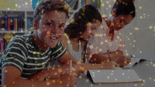 3 students studying as camera pulling left student glancing, yellow node overlay staying over notes