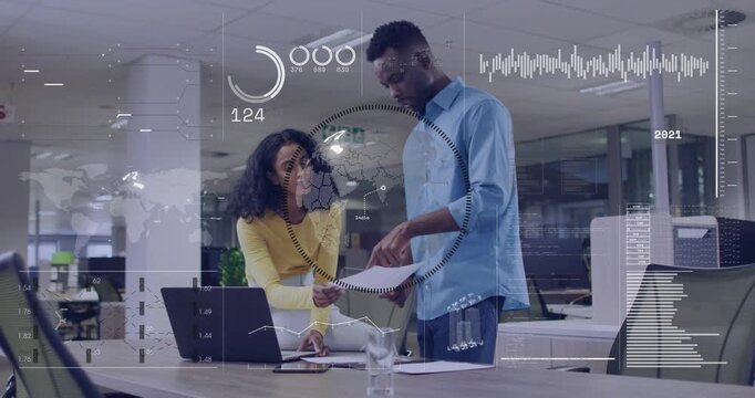 Woman pointing paper and man typing laptop checking business data and causing rings changing